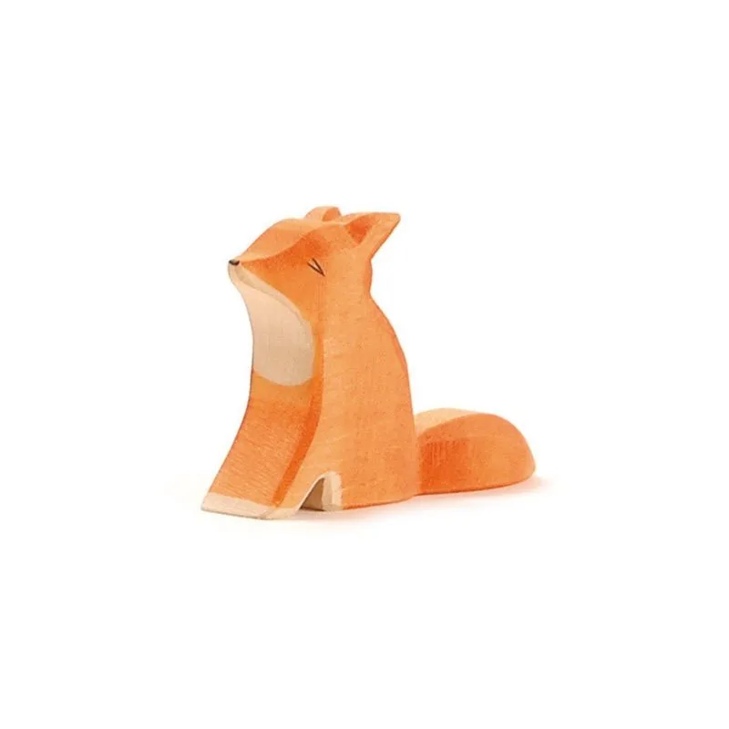 Animaux en bois par Ostheimer le petit renard assis